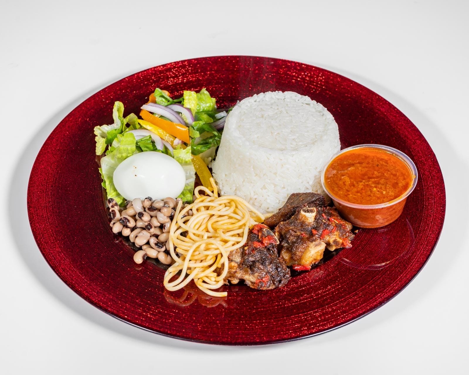 Ghana Jollof-White Rice with Salad and assorted meat